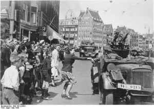 Woman welcoming German soldiers photo