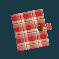 Anne Frank's Diary showing the outside, which is red plaid