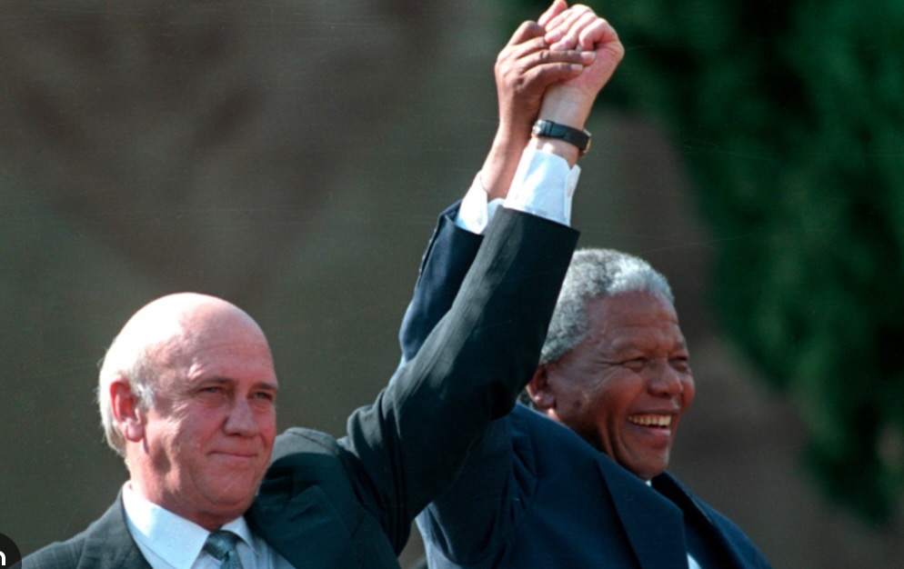 De Klerk and Mandela together with hands joined